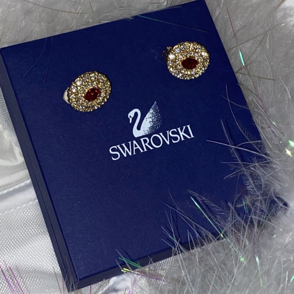 Swarovski swan signed gold plated earrings clip on